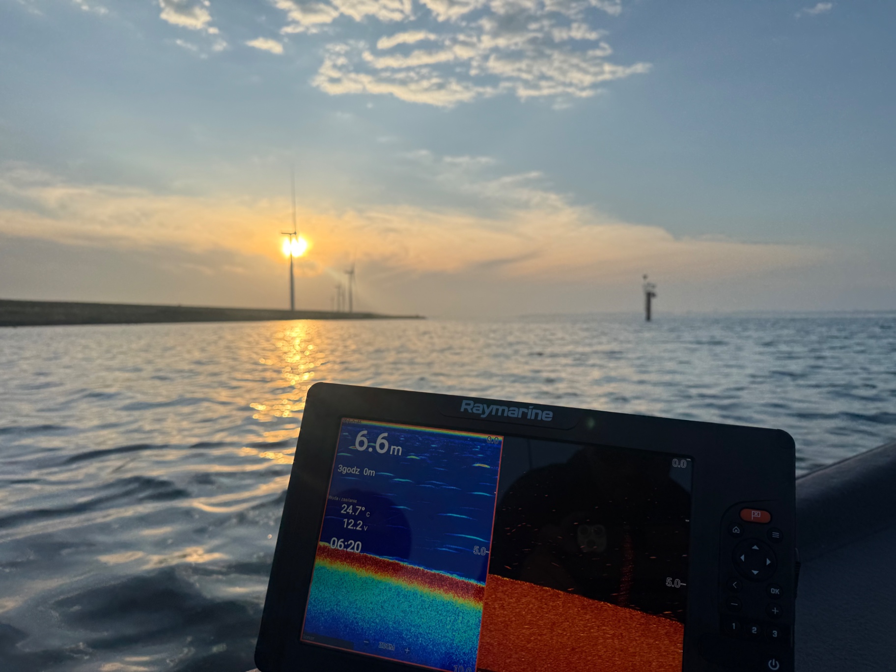 Self-drive fishing boat on Grevelingenmeer at sunrise